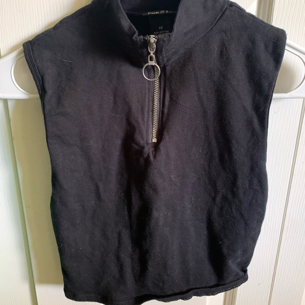 Black Zip up cropped shirt.